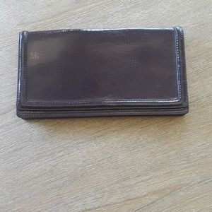 Purple patent leather clutch purse